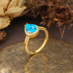 Luxurious and Unique 4-Prong Pear Cut Turquoise Engagement Ring - Additional view