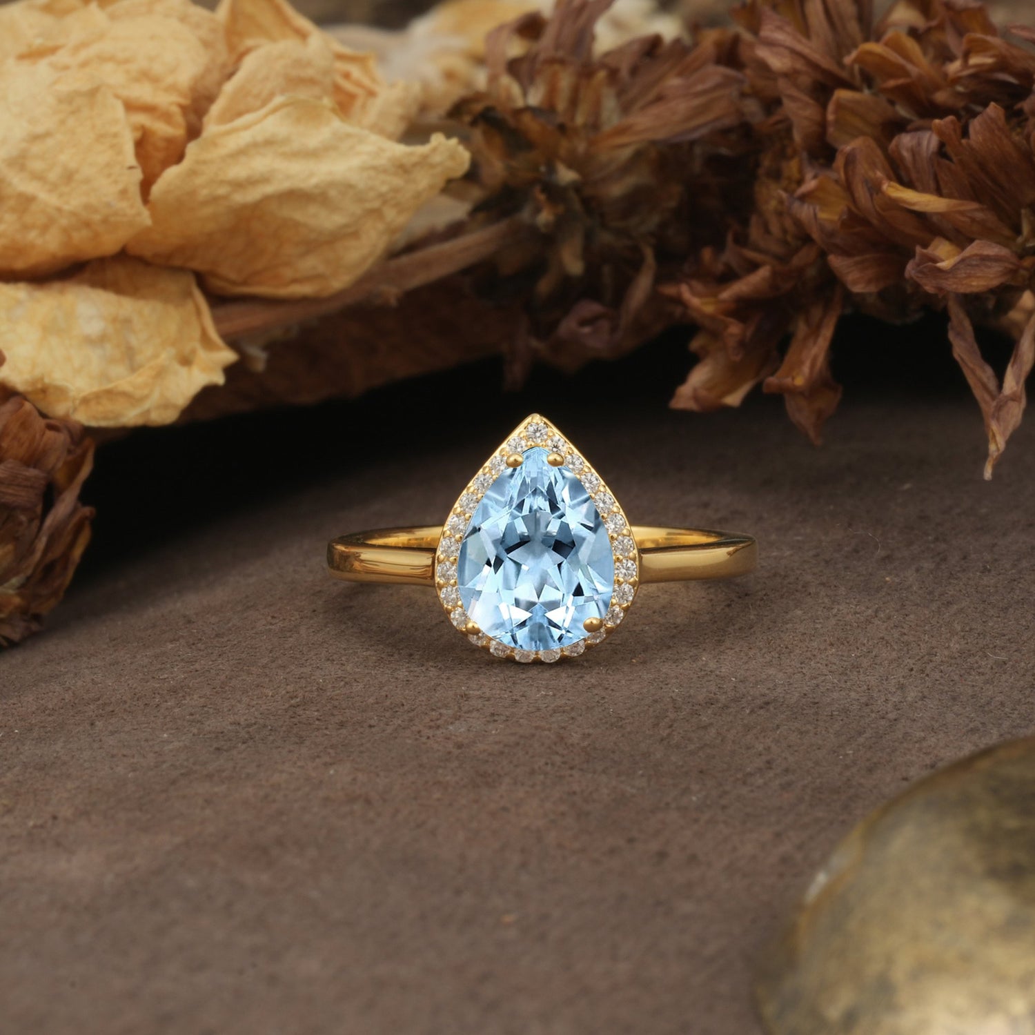 Luxurious and Unique 4-Prong Pear Cut Aquamarine Engagement Ring