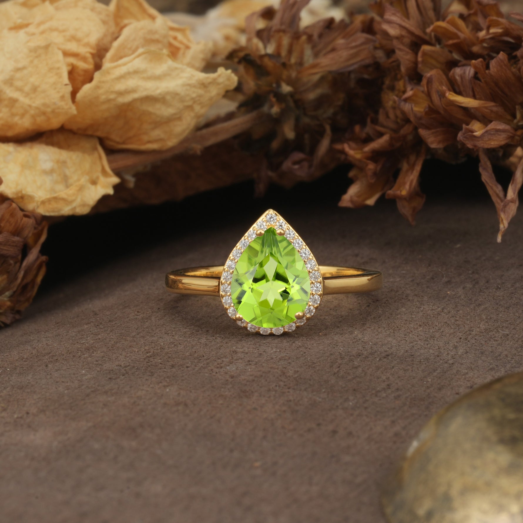 Luxurious and Unique 4-Prong Pear Cut Peridot Engagement Ring - Additional view