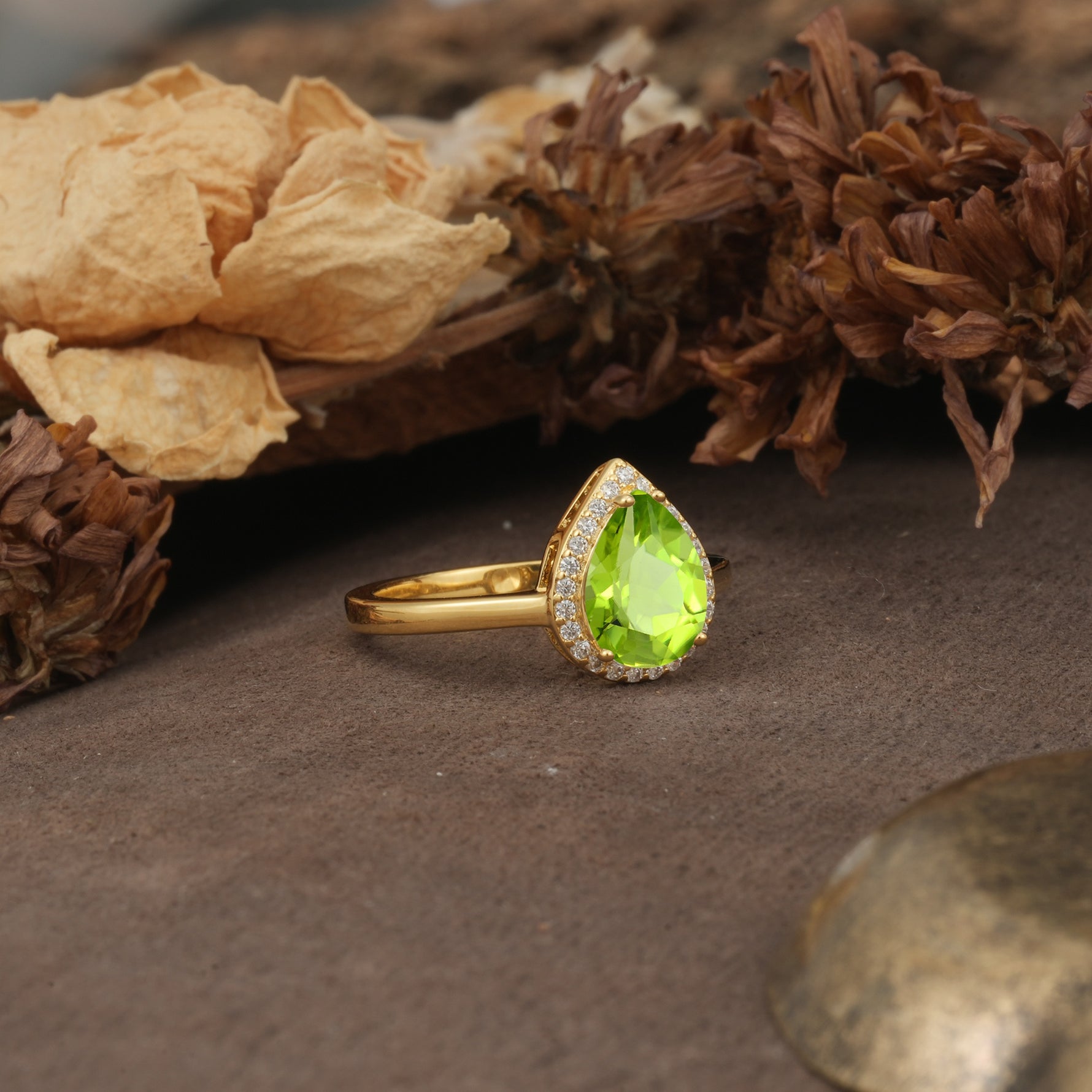 Luxurious and Unique 4-Prong Pear Cut Peridot Engagement Ring - Additional view
