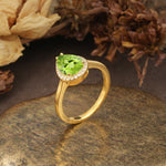 Luxurious and Unique 4-Prong Pear Cut Peridot Engagement Ring - Additional view