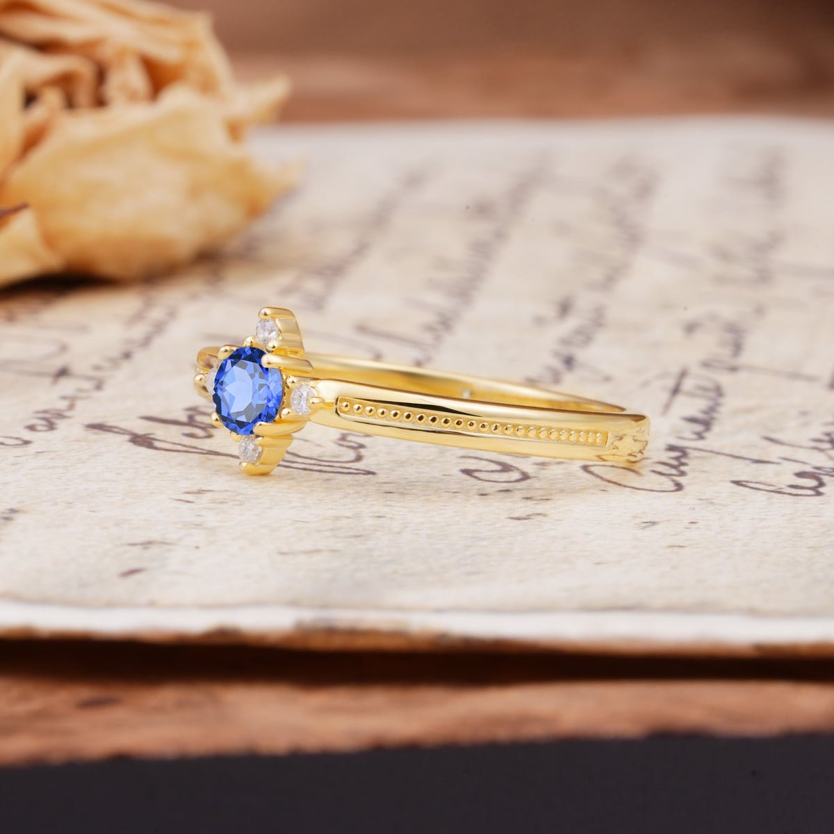 Simple 4-Prong Round Cut Sapphire Side Stone Engagement Ring - Additional view