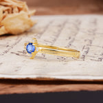 Simple 4-Prong Round Cut Sapphire Side Stone Engagement Ring - Additional view