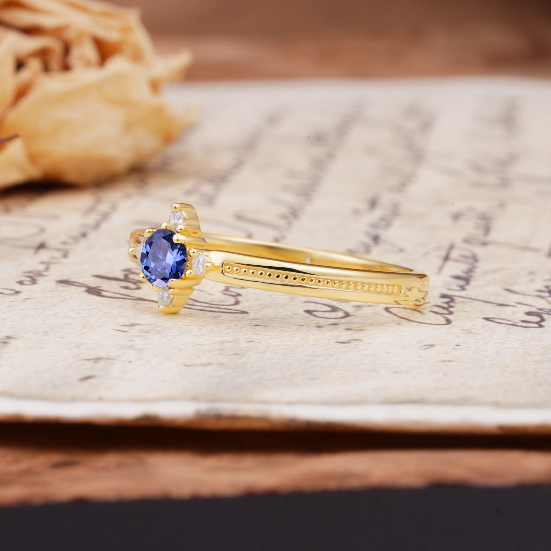 Simple 4-Prong Round Cut Tanzanite Side Stone Engagement Ring - Additional view