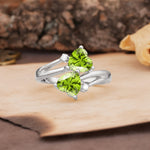 Classic Twisted 3-Prong Double Heart Cut Peridot Engagement Ring - Additional view