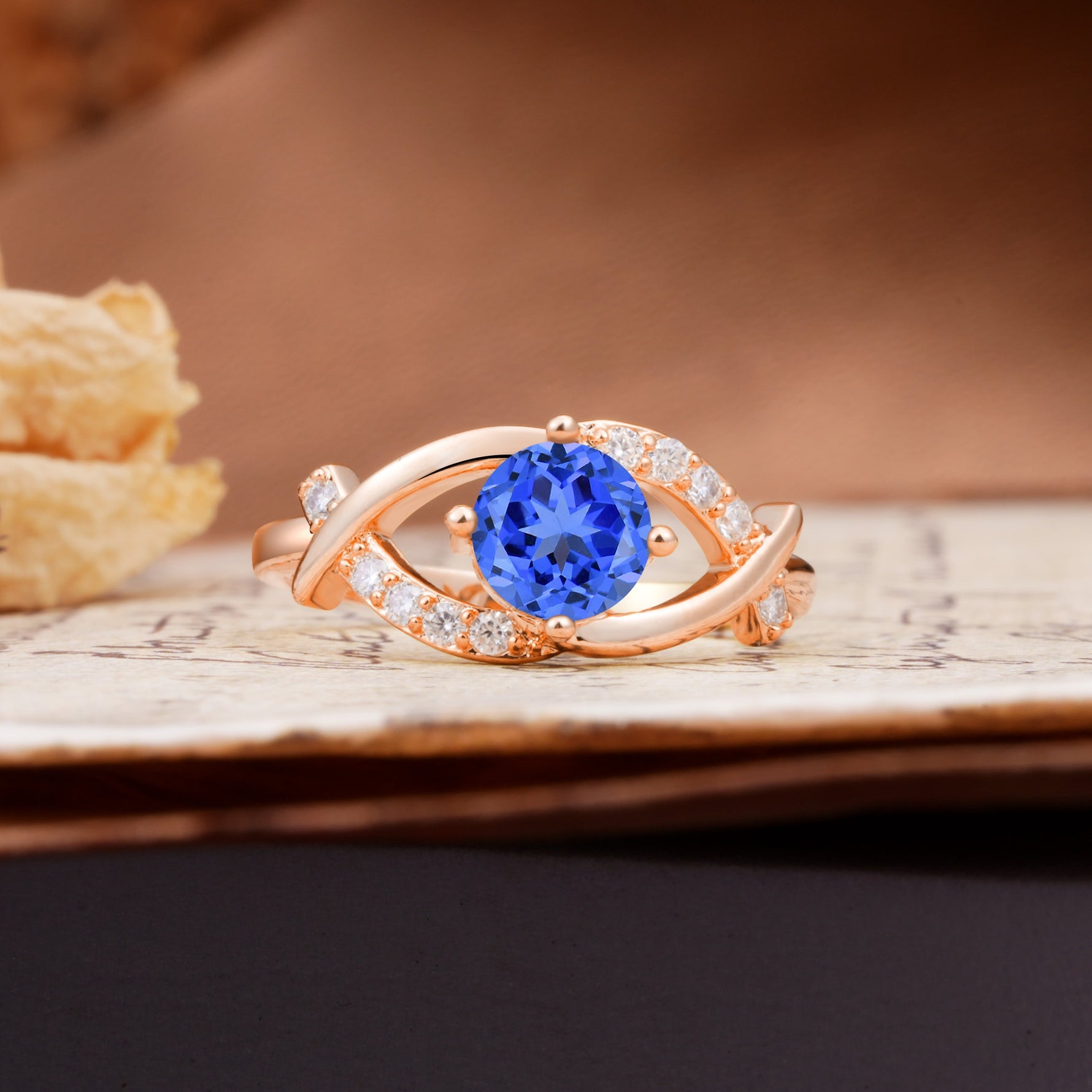 Unique and Luxurious 4-Prong Wrapped Round Cut Sapphire Engagement Ring - Additional view