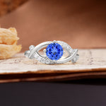 Unique and Luxurious 4-Prong Wrapped Round Cut Sapphire Engagement Ring - Additional view