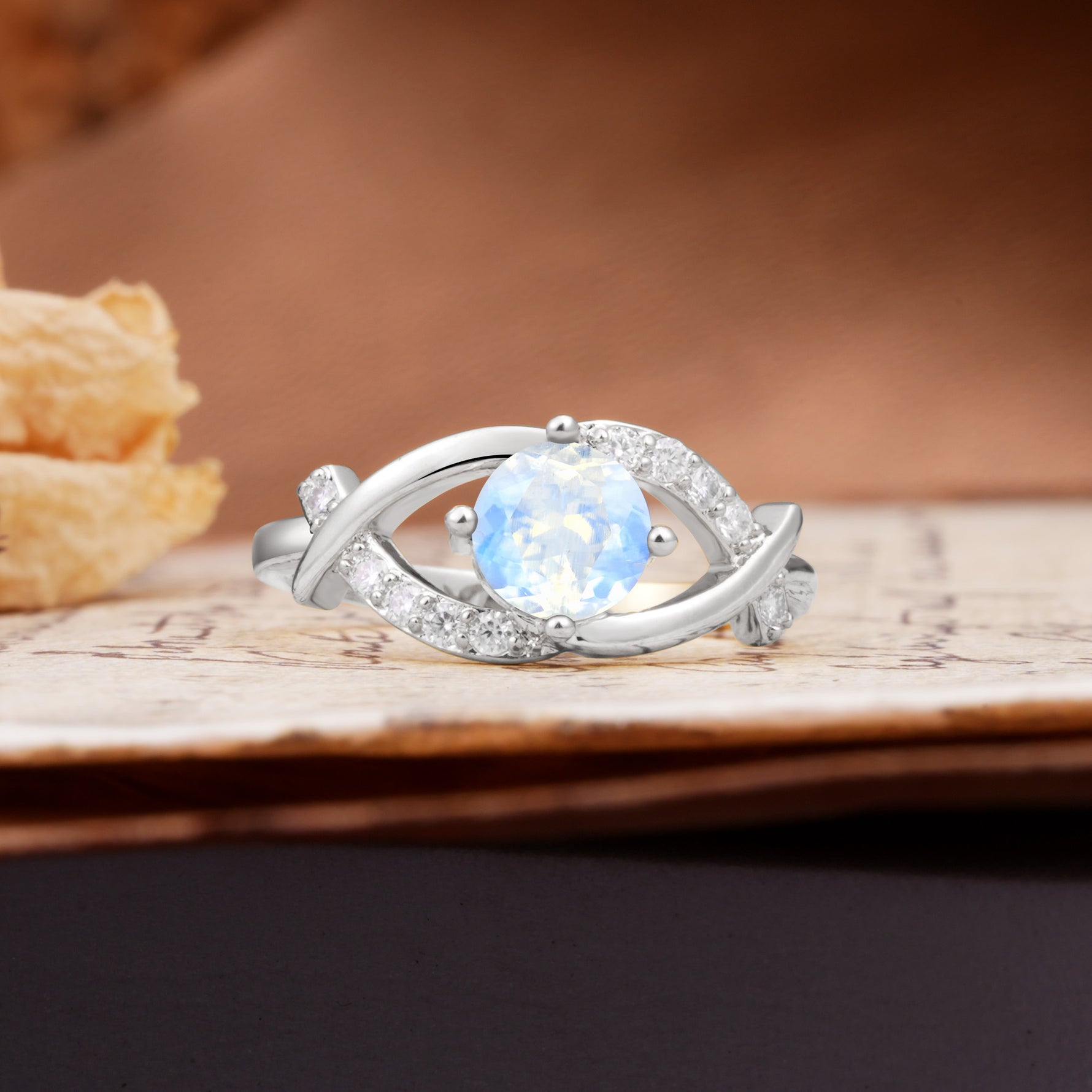 Unique and Luxurious 4-Prong Wrapped Round Cut Moonstone Engagement Ring - Additional view