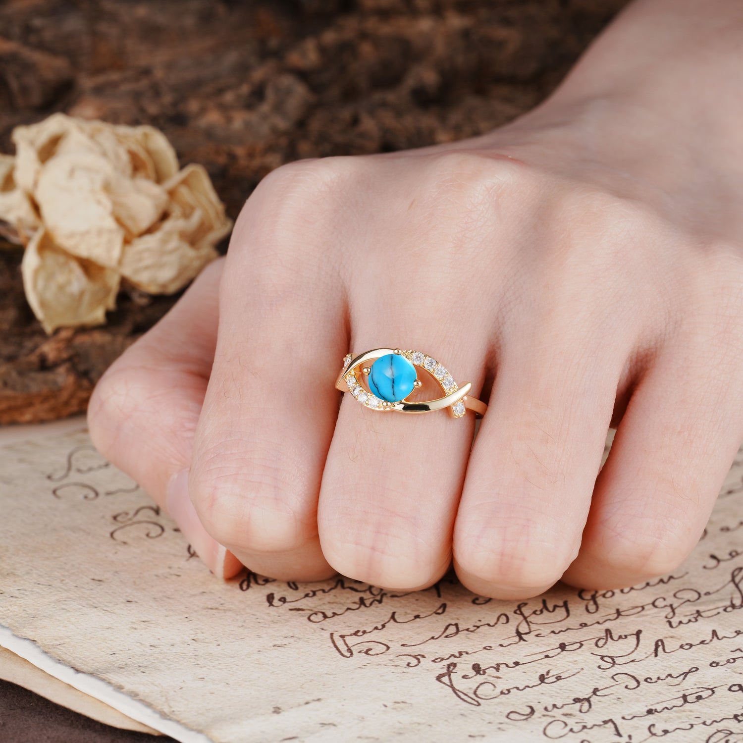 Unique and Luxurious 4-Prong Wrapped Round Cut Turquoise Engagement Ring