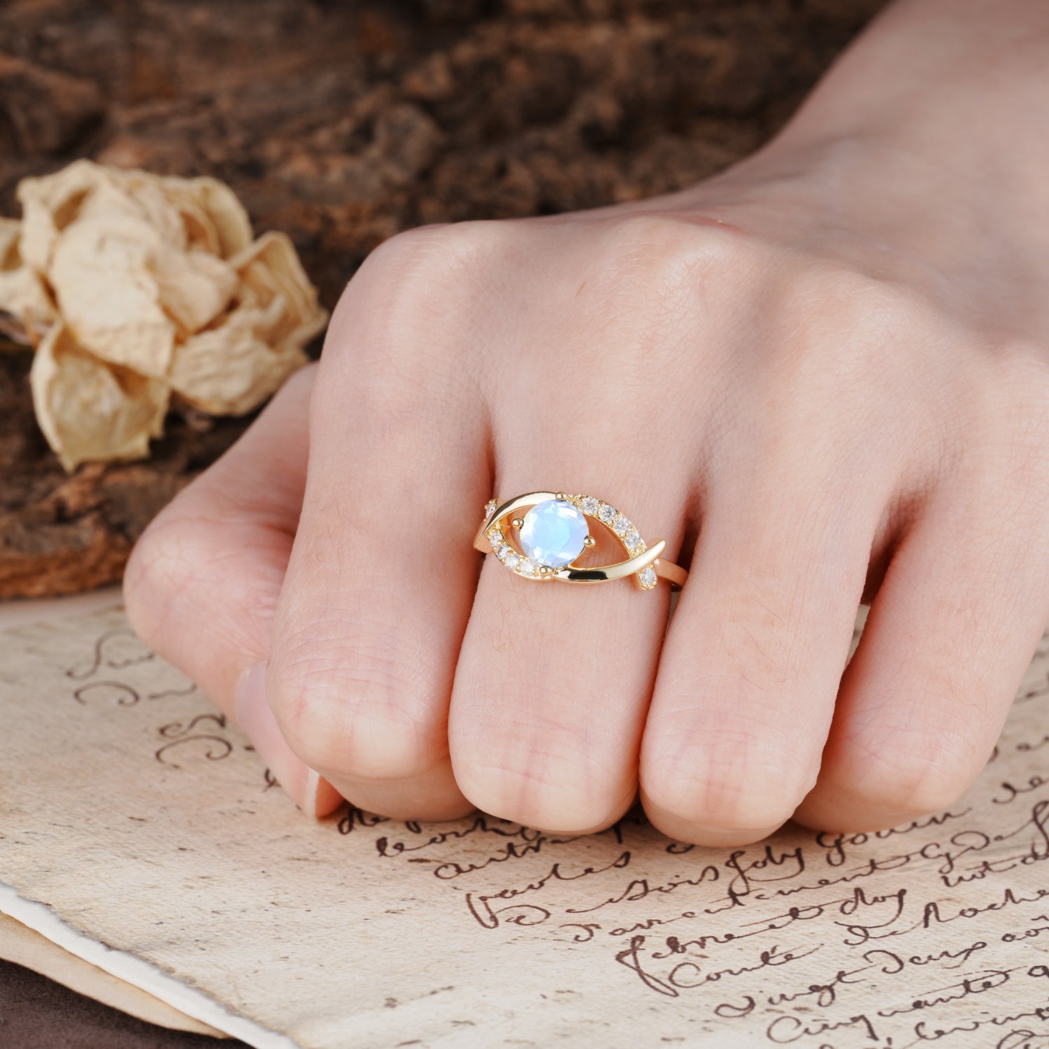 Unique and Luxurious 4-Prong Wrapped Round Cut Moonstone Engagement Ring