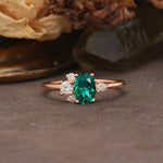 Unique & Classic 4-Prong Setting with Oval-Cut Side Stones Emerald Engagement Ring - Additional view