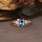 Unique & Classic 4-Prong Setting with Oval-Cut Side Stones Alexandrite Engagement Ring - Additional view