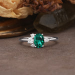 Unique & Classic 4-Prong Setting with Oval-Cut Side Stones Emerald Engagement Ring - Additional view
