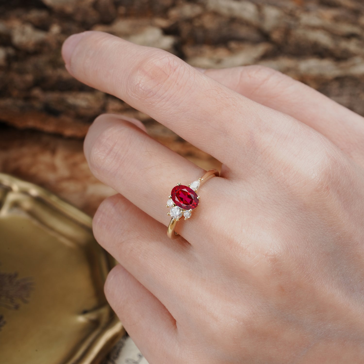 Unique & Classic 4-Prong Setting with Oval-Cut Side Stones Ruby Engagement Ring