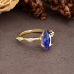 Unique, Minimalist 4-Prong Marquise Cut Tanzanite Engagement Ring - Additional view