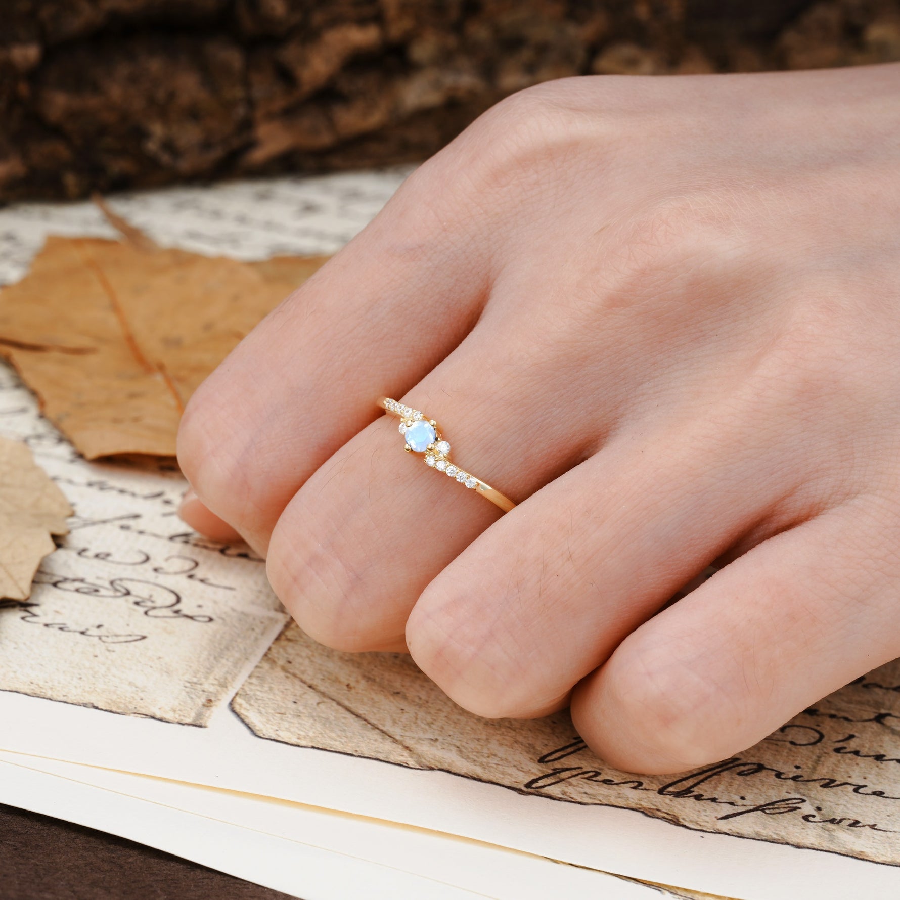 Simple Classic 4-Prong Round Cut Moonstone Side Stone Engagement Ring - Additional view