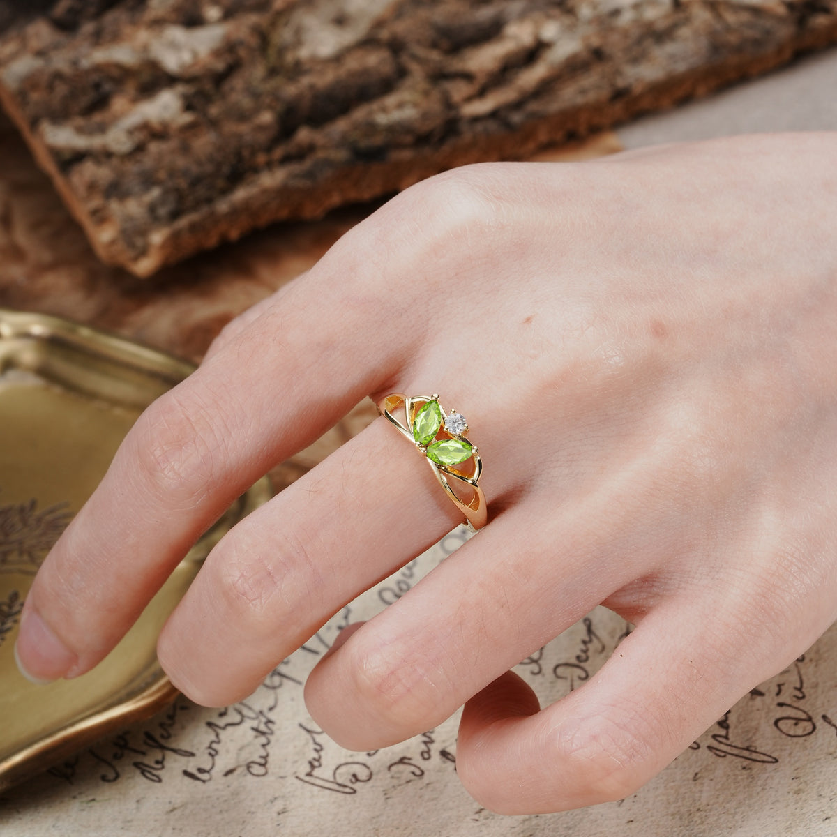 Unique, Luxurious Crown-Style 2-Prong Marquise Cut Peridot Three Stones Wedding Ring - Additional view