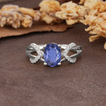 Dual Cross X Pave Accent Oval Cut Tanzanite Engagement Ring - Additional view
