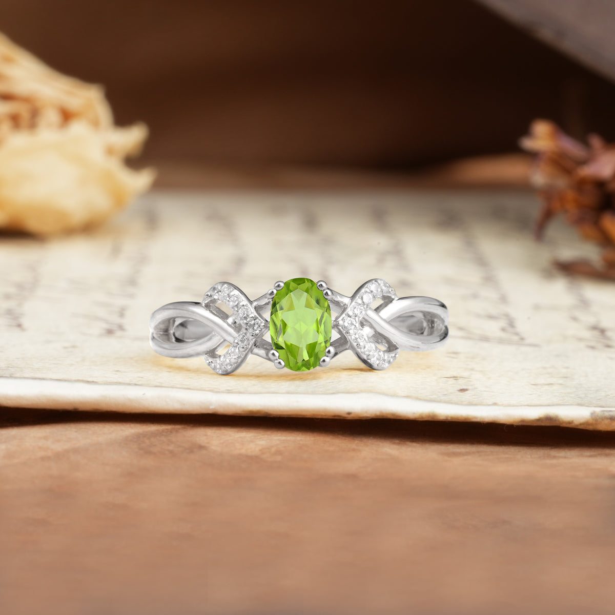 Uniquely Creative 8-Prong Setting with Oval Cut Peridot Engagement Ring - Additional view