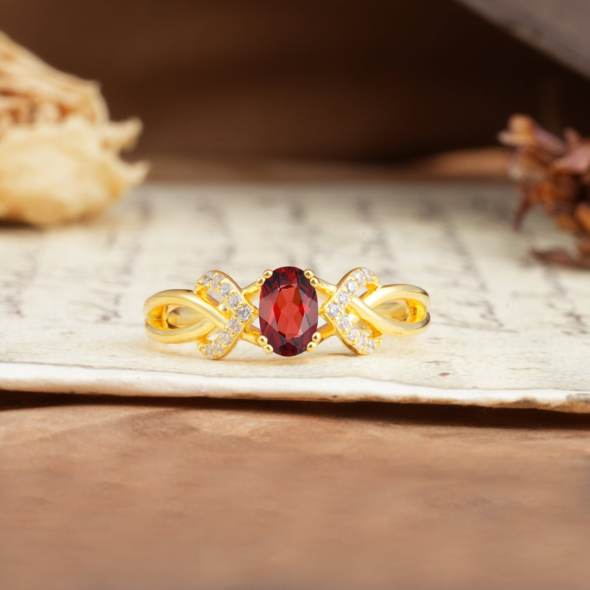 Uniquely Creative 8-Prong Setting with Oval Cut Garnet Engagement Ring