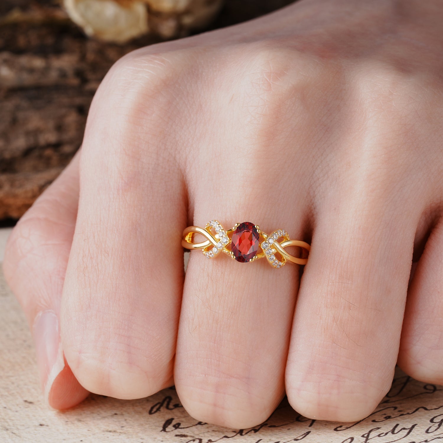 Uniquely Creative 8-Prong Setting with Oval Cut Garnet Engagement Ring