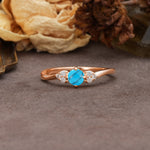 Unique Twisted 4-Prong Round Cut Turquoise Engagement Ring - Additional view