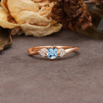 Unique Twisted 4-Prong Round Cut Aquamarine Engagement Ring - Additional view