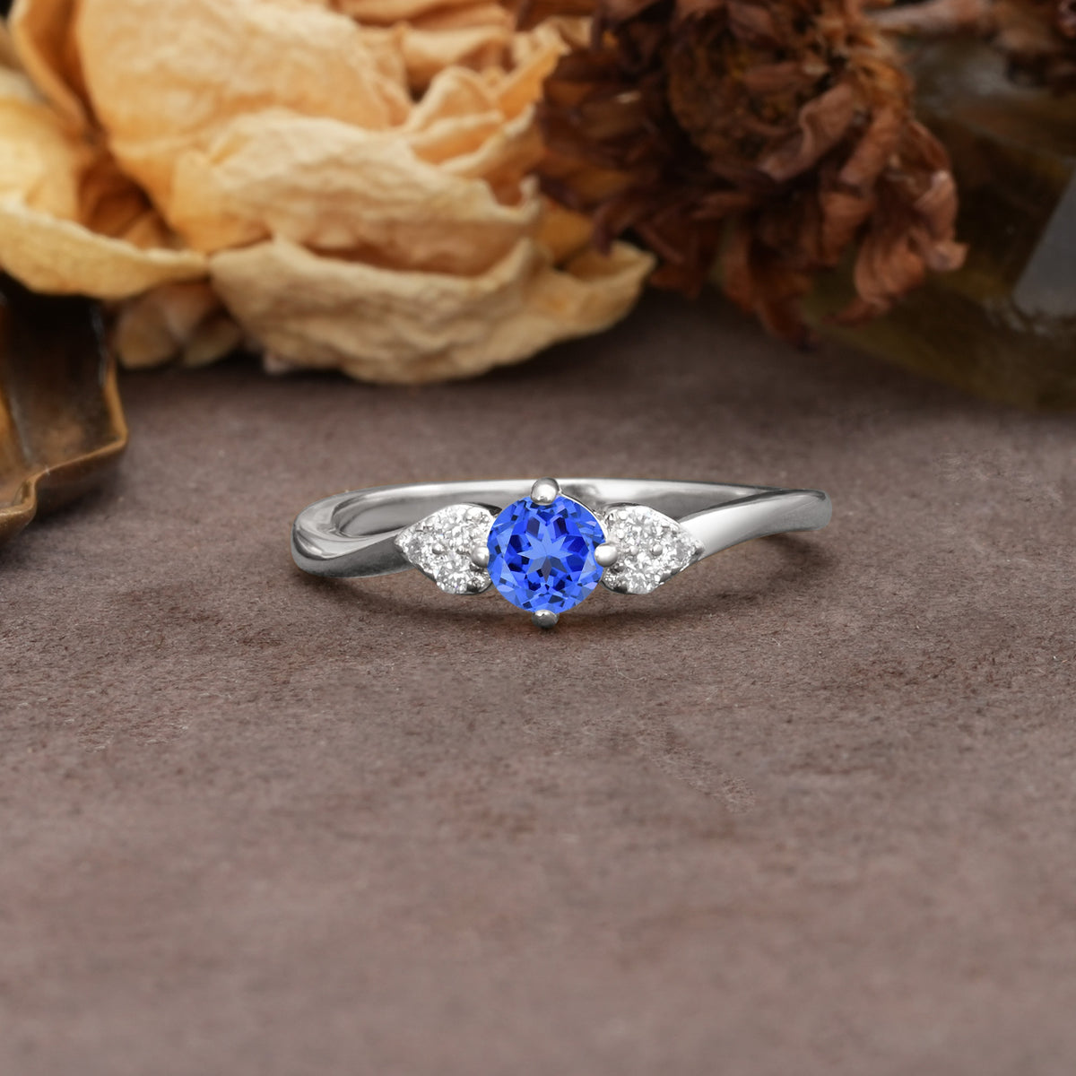 Unique Twisted 4-Prong Round Cut Sapphire Engagement Ring - Additional view