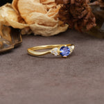 Unique Twisted 4-Prong Round Cut Tanzanite Engagement Ring - Additional view