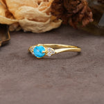 Unique Twisted 4-Prong Round Cut Turquoise Engagement Ring - Additional view