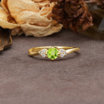 Unique Twisted 4-Prong Round Cut Peridot Engagement Ring - Additional view