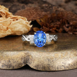 Nature-Inspired, Uniquely Luxurious: Twisted and Entwined 4-Prong Oval Cut Sapphire Engagement Ring - Additional view