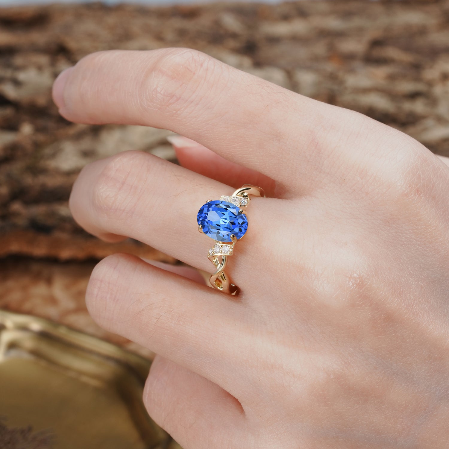 Nature-Inspired, Uniquely Luxurious: Twisted and Entwined 4-Prong Oval Cut Sapphire Engagement Ring