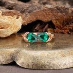 Uniquely Creative 3-Prong Double Pear-Cut Emerald Two Stones Wedding Ring - Additional view