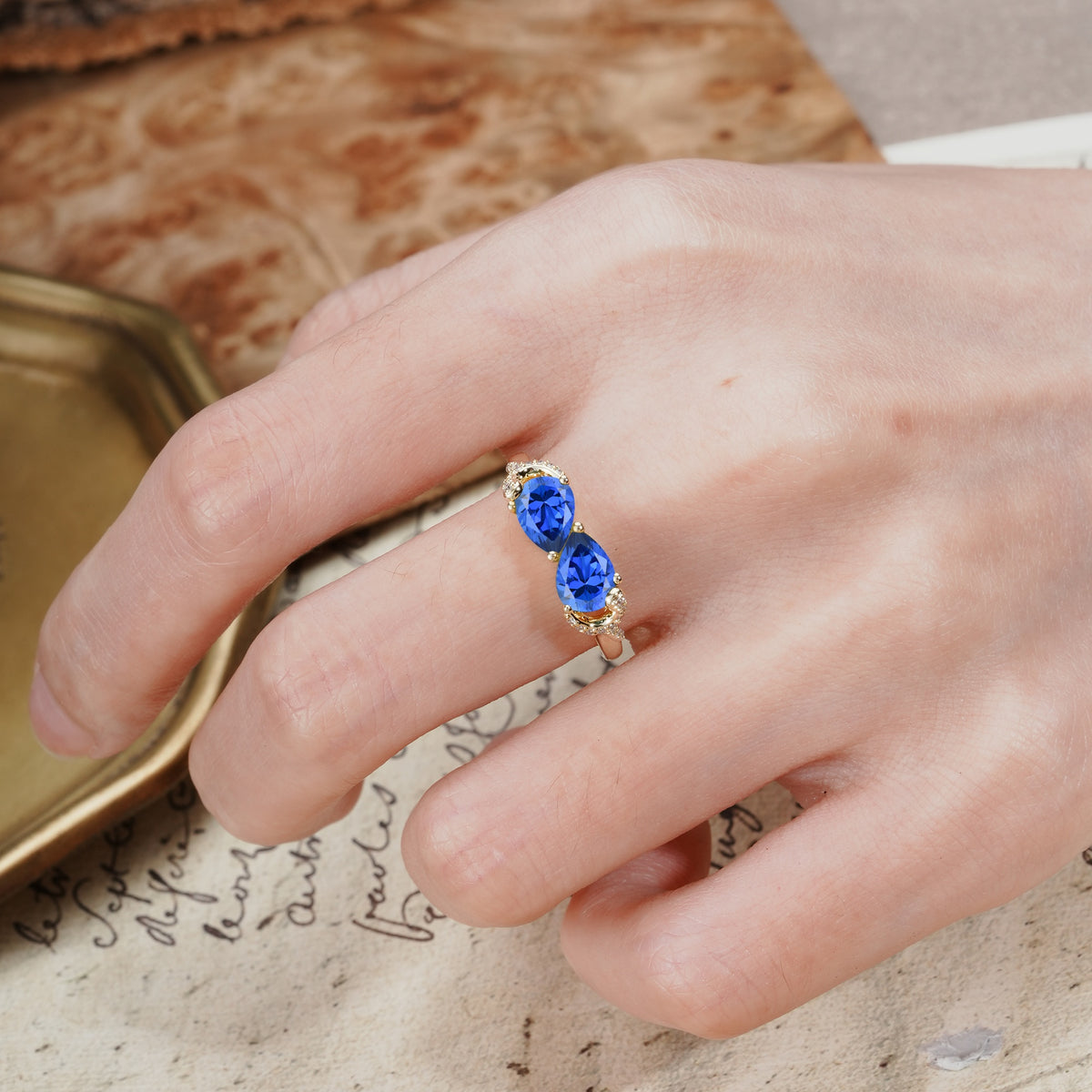 Uniquely Creative 3-Prong Double Pear-Cut Sapphire Two Stones Wedding Ring - Additional view