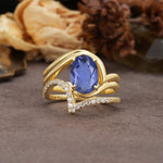Unique Twisted, Entwined 4-Prong Oval-Cut Tanzanite Bridal Ring Set - Yellow-Gold