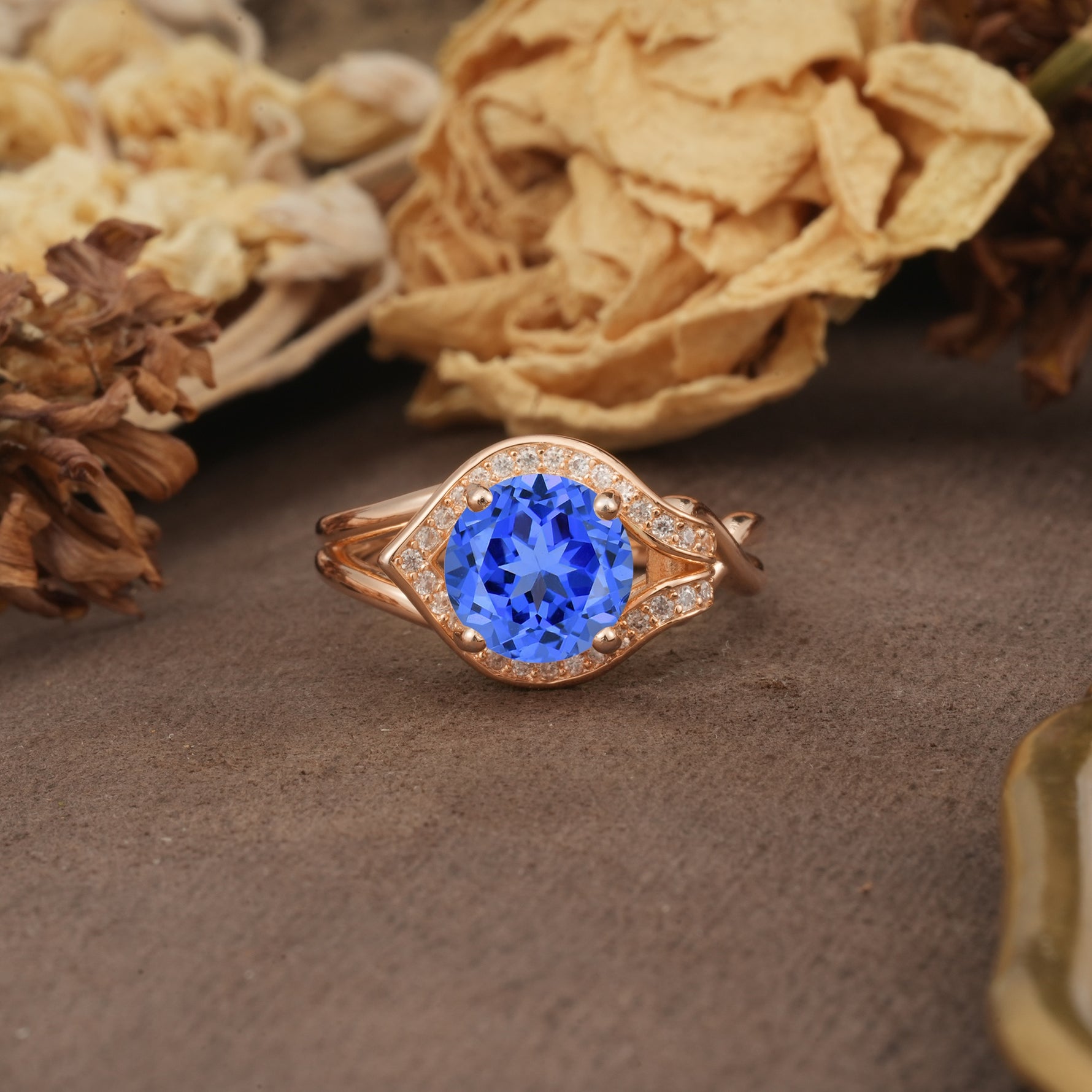 Unique, Luxurious, Twisted 4-Prong Round Cut Sapphire Engagement Ring - Additional view