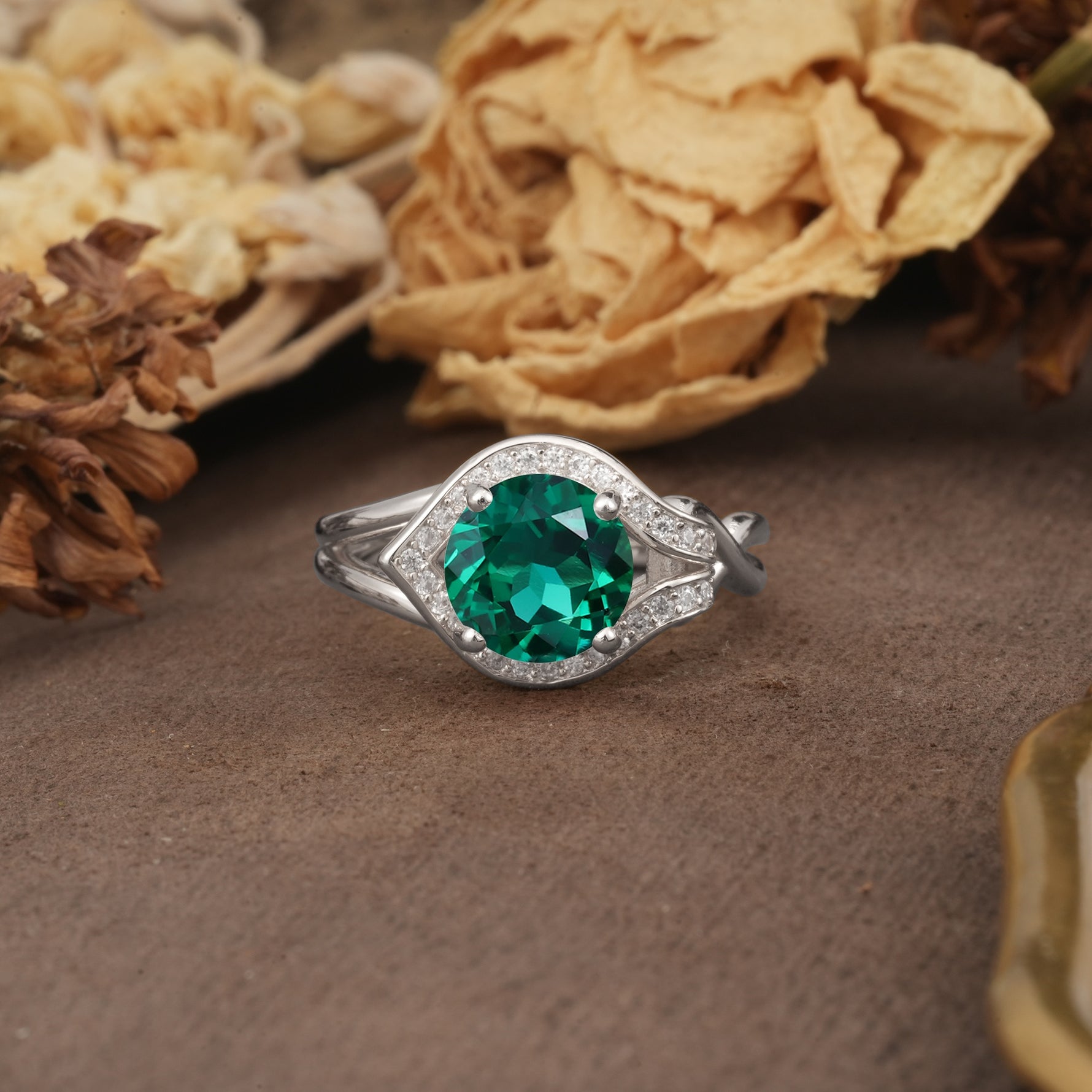 Unique, Luxurious, Twisted 4-Prong Round Cut Emerald Engagement Ring - Additional view