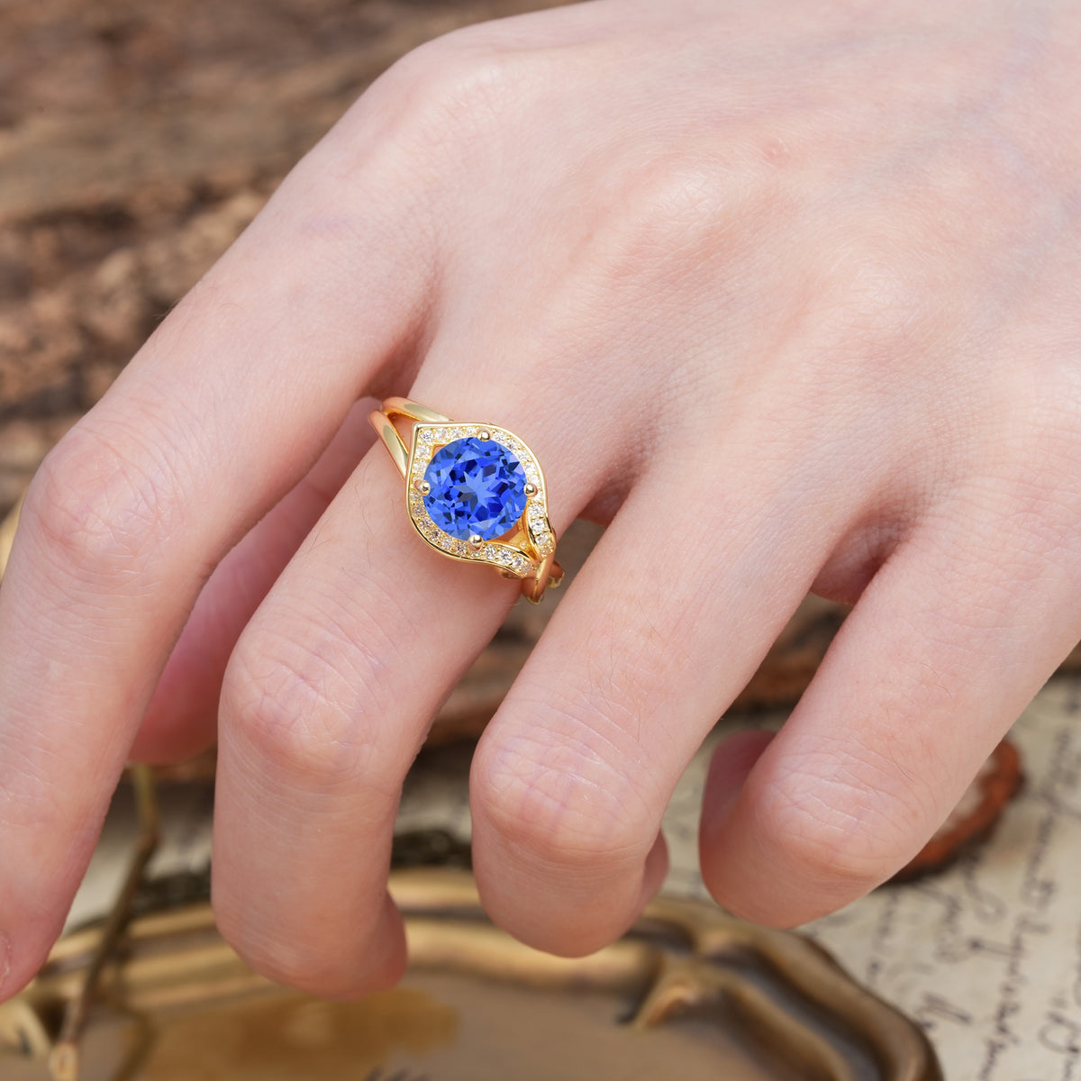 Unique, Luxurious, Twisted 4-Prong Round Cut Sapphire Engagement Ring - Additional view