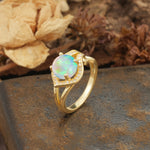 Unique, Luxurious, Twisted 4-Prong Round Cut Fire Opal Engagement Ring - Additional view