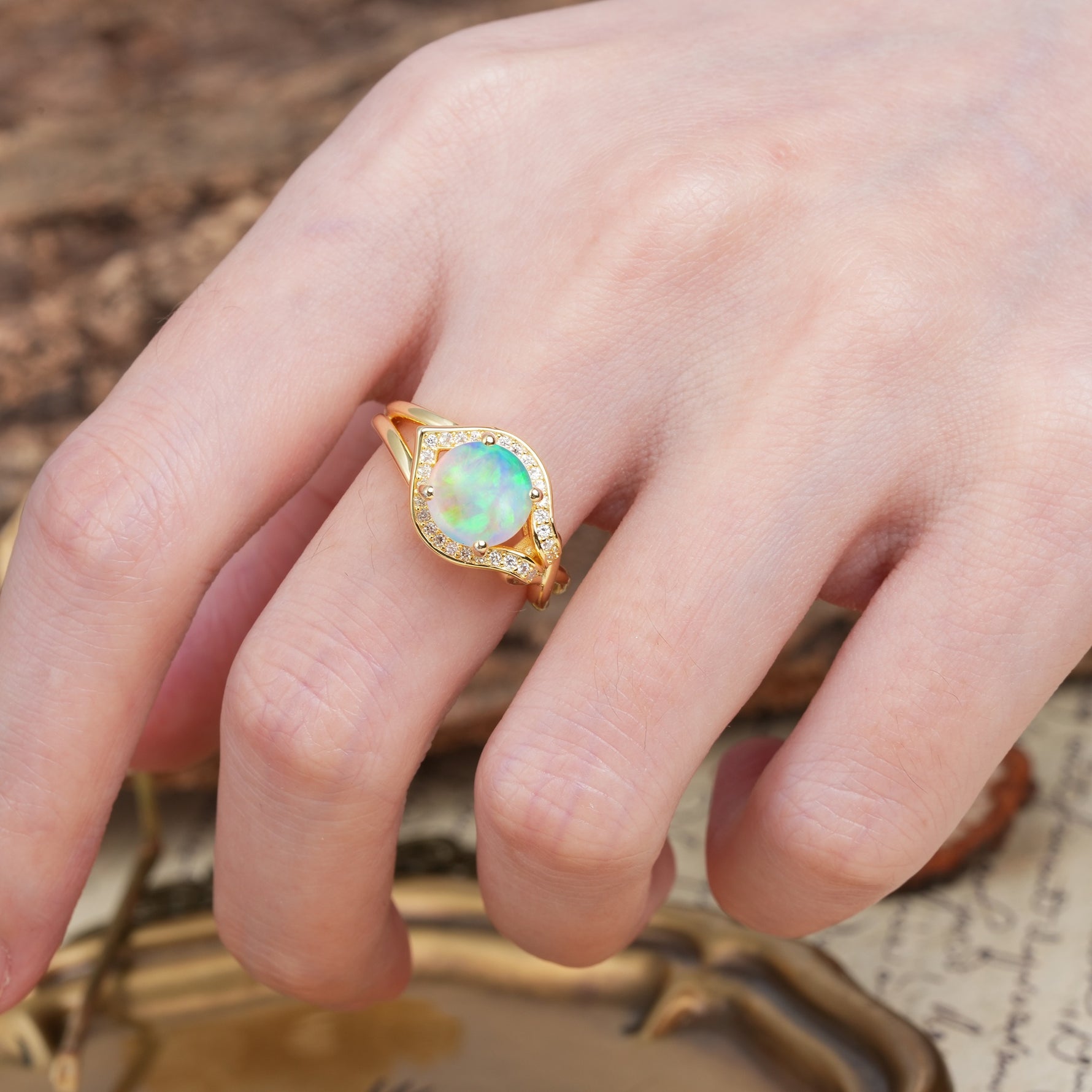 Unique, Luxurious, Twisted 4-Prong Round Cut Fire Opal Engagement Ring - Additional view