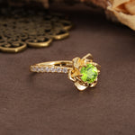 Nature-Inspired Unique Floral Design 6-Prong Round Cut Peridot Engagement Ring - Additional view