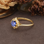 Nature-Inspired Unique Floral-Shaped 4-Prong Round-Cut Tanzanite Engagement Ring - Additional view