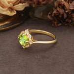 Nature-Inspired Unique Floral-Shaped 4-Prong Round-Cut Peridot Engagement Ring - Additional view