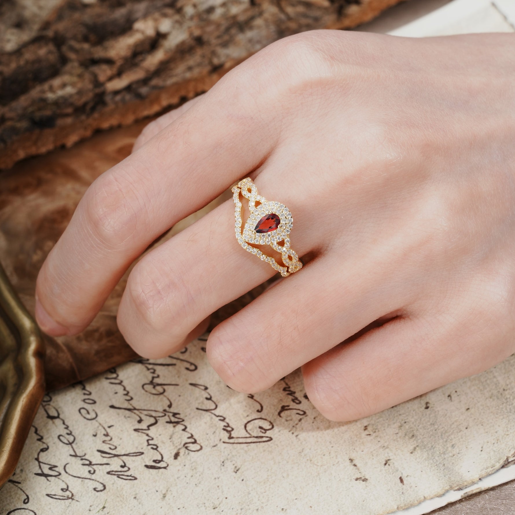Luxurious Vintage-Style Pavé, 3-Prong Pear Cut Garnet Bridal Ring Set - Additional view