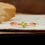 Classic and Minimalist 4-Prong Round-Cut Three-Stone Peridot Engagement Ring - Additional view