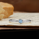 Classic and Minimalist 4-Prong Round-Cut Three-Stone Aquamarine Engagement Ring - Additional view