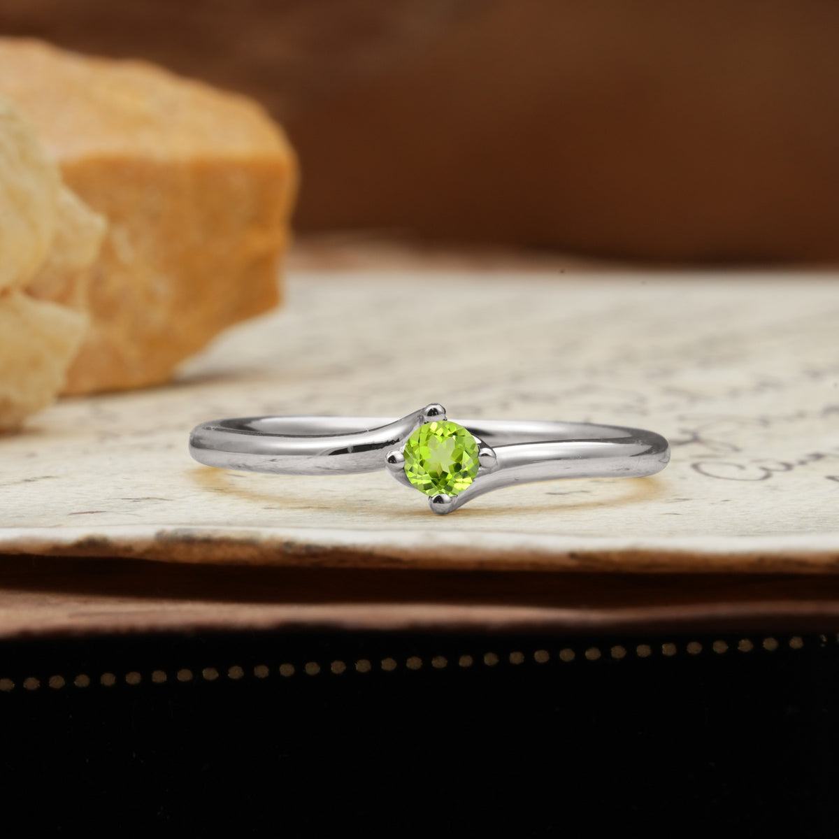 Classic and Minimalist 4-Prong Round-Cut Three-Stone Peridot Engagement Ring - Additional view