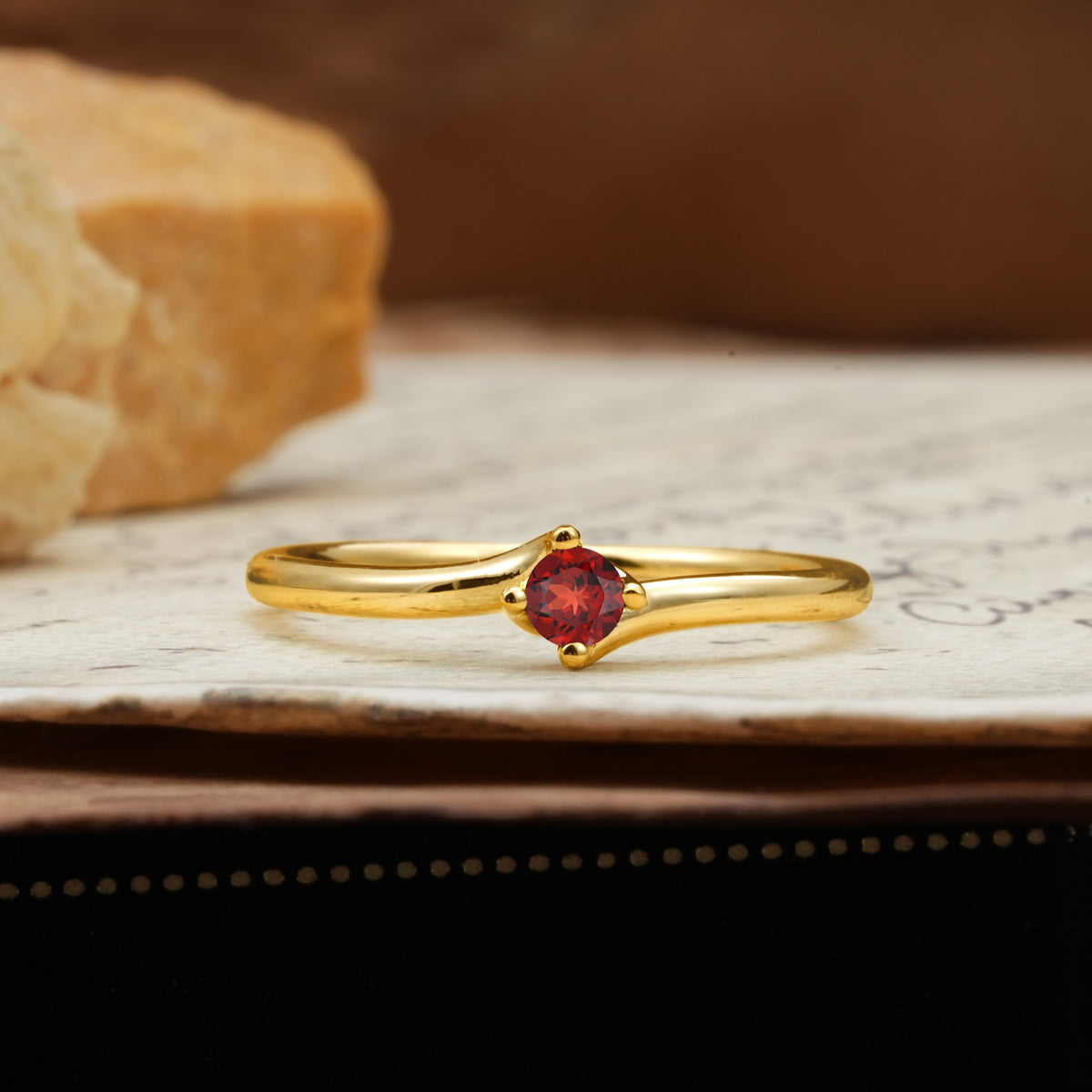 Classic and Minimalist 4-Prong Round-Cut Three-Stone Garnet Engagement Ring - Additional view