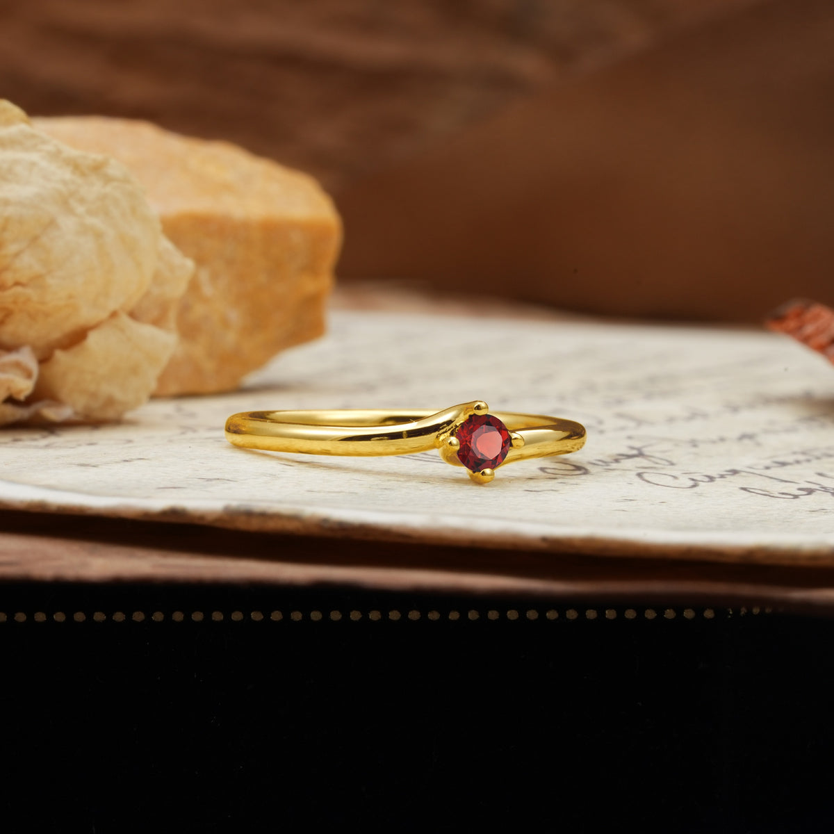 Classic and Minimalist 4-Prong Round-Cut Three-Stone Garnet Engagement Ring - Additional view